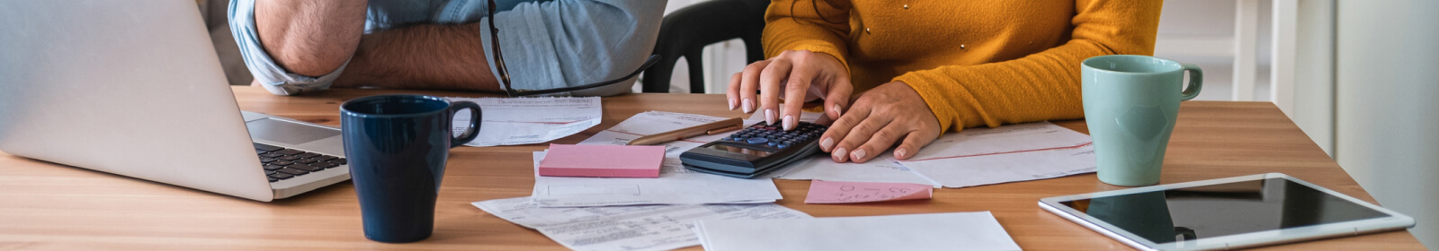 couple using a calculator